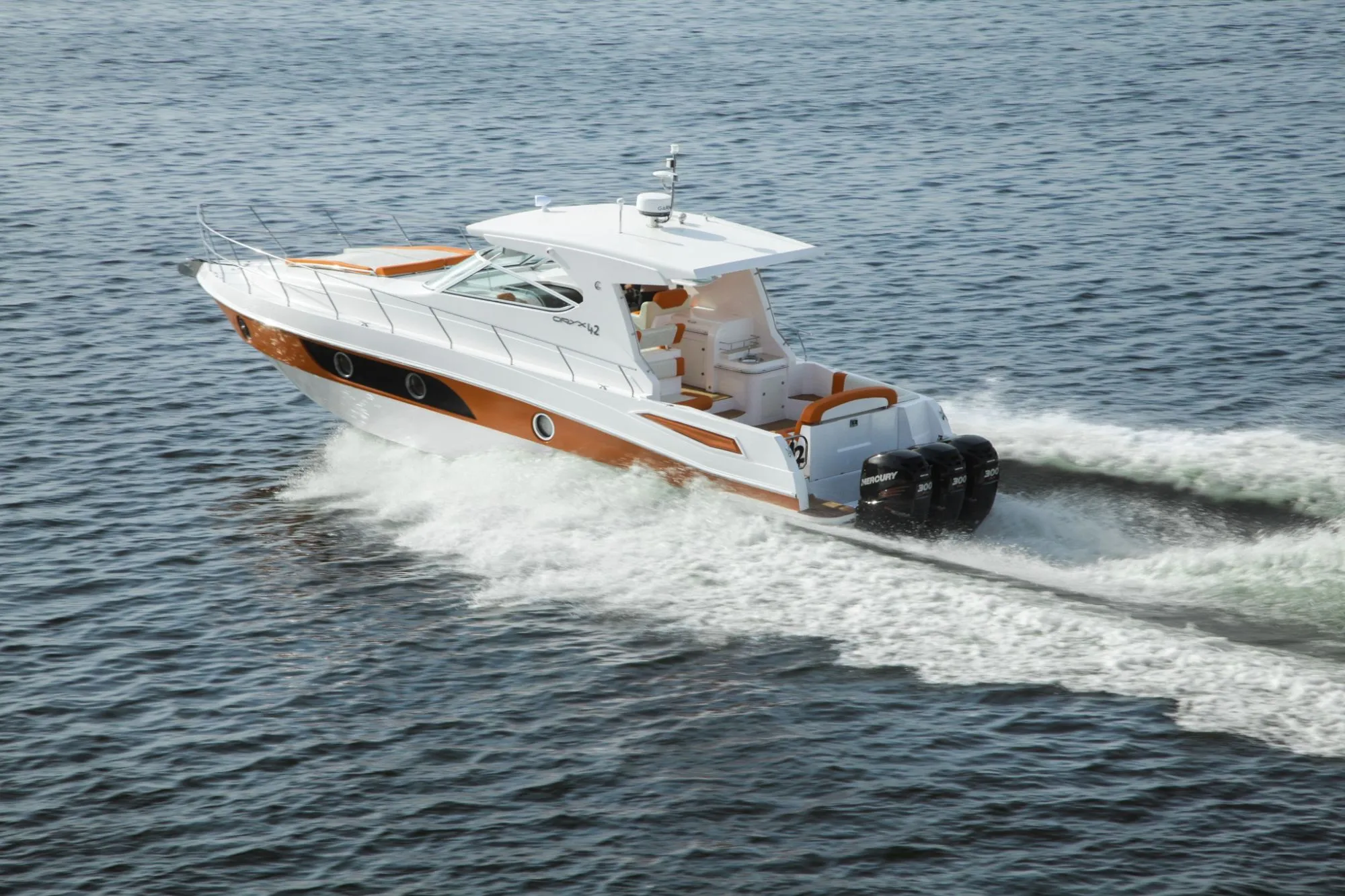 Oryx 42 sport cruiser by Gulf Craft, triple Mercury 300s, white and orange livery